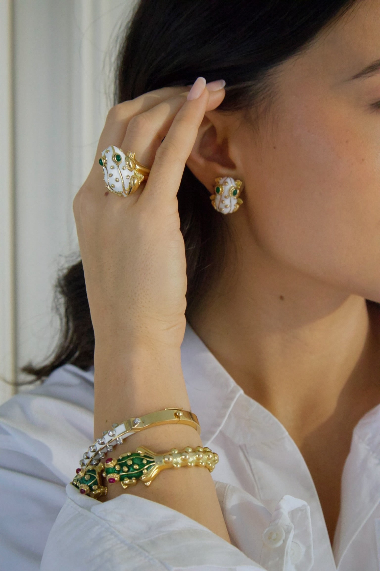 18k yellow gold white enamel frog earrings with emeralds by David Webb Tiny Gods