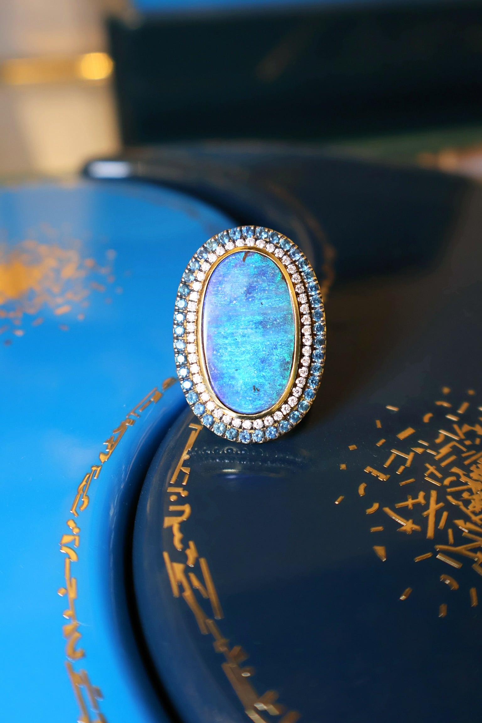 Opal Ring with Diamond & Blue Sapphire Border