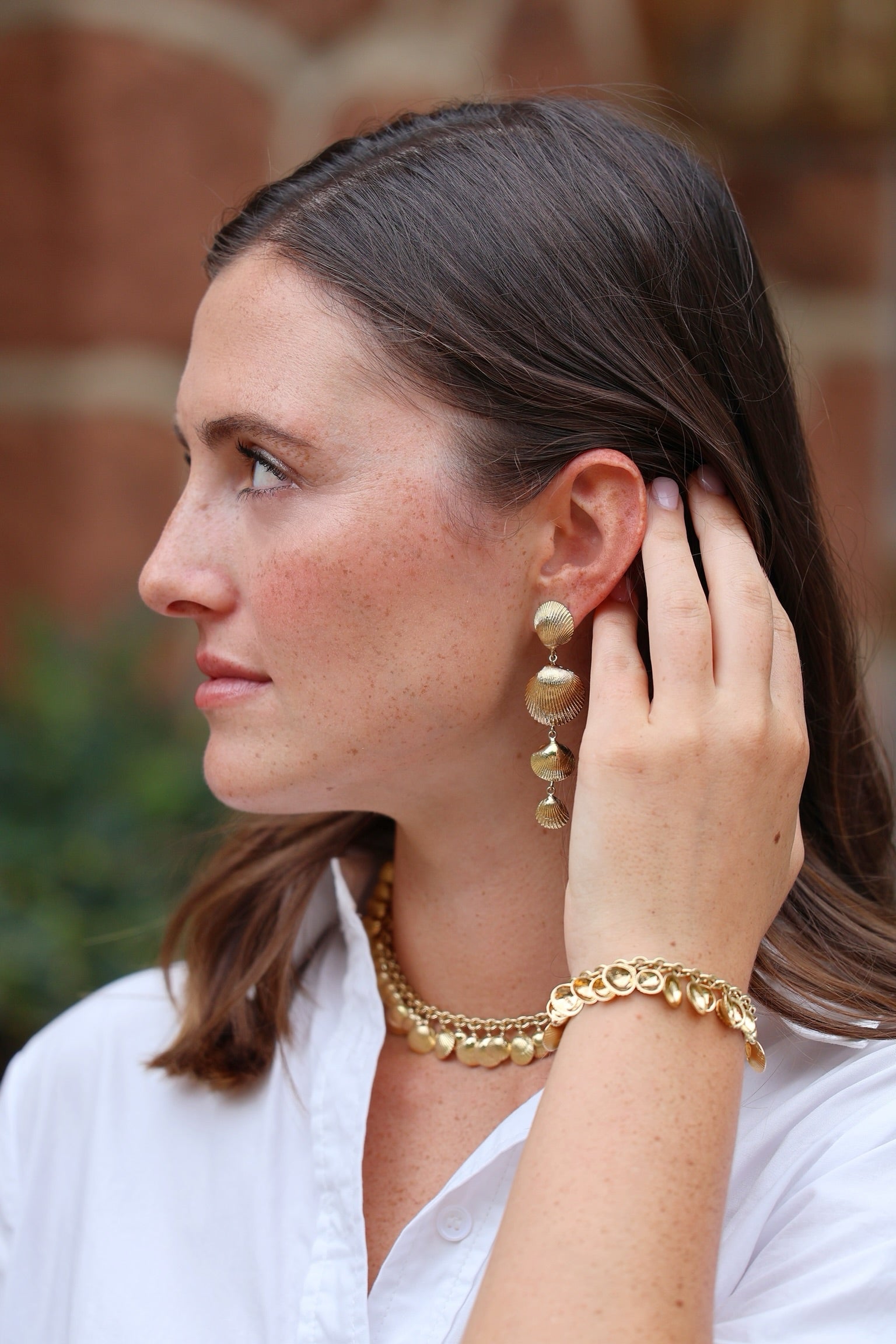 18k yellow gold shell drop earrings by Cadar tiny Gods