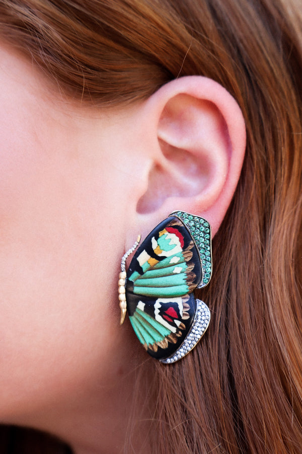 18K yellow gold emerald and diamond Butterfly Earrings by Silvia Furmanovich green red brown black tiny gods on model