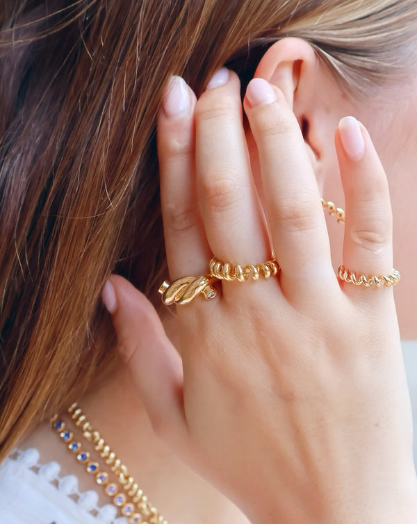 18k yellow gold jumbo ties ring by Boochier at Tiny Gods on model