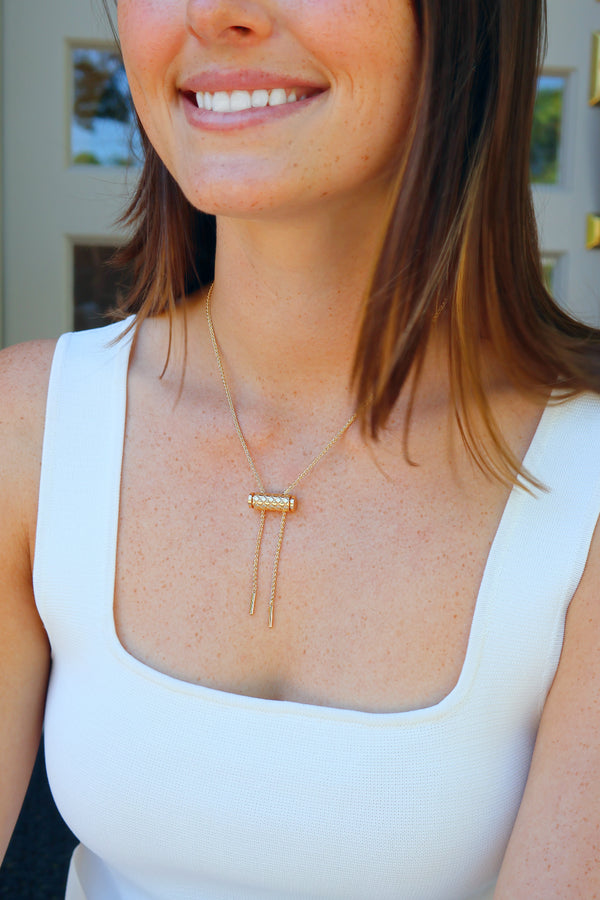 18K yellow gold bar latch pendant Nouvel Heritage gold 18k yellow tiny gods on chain lariat on model