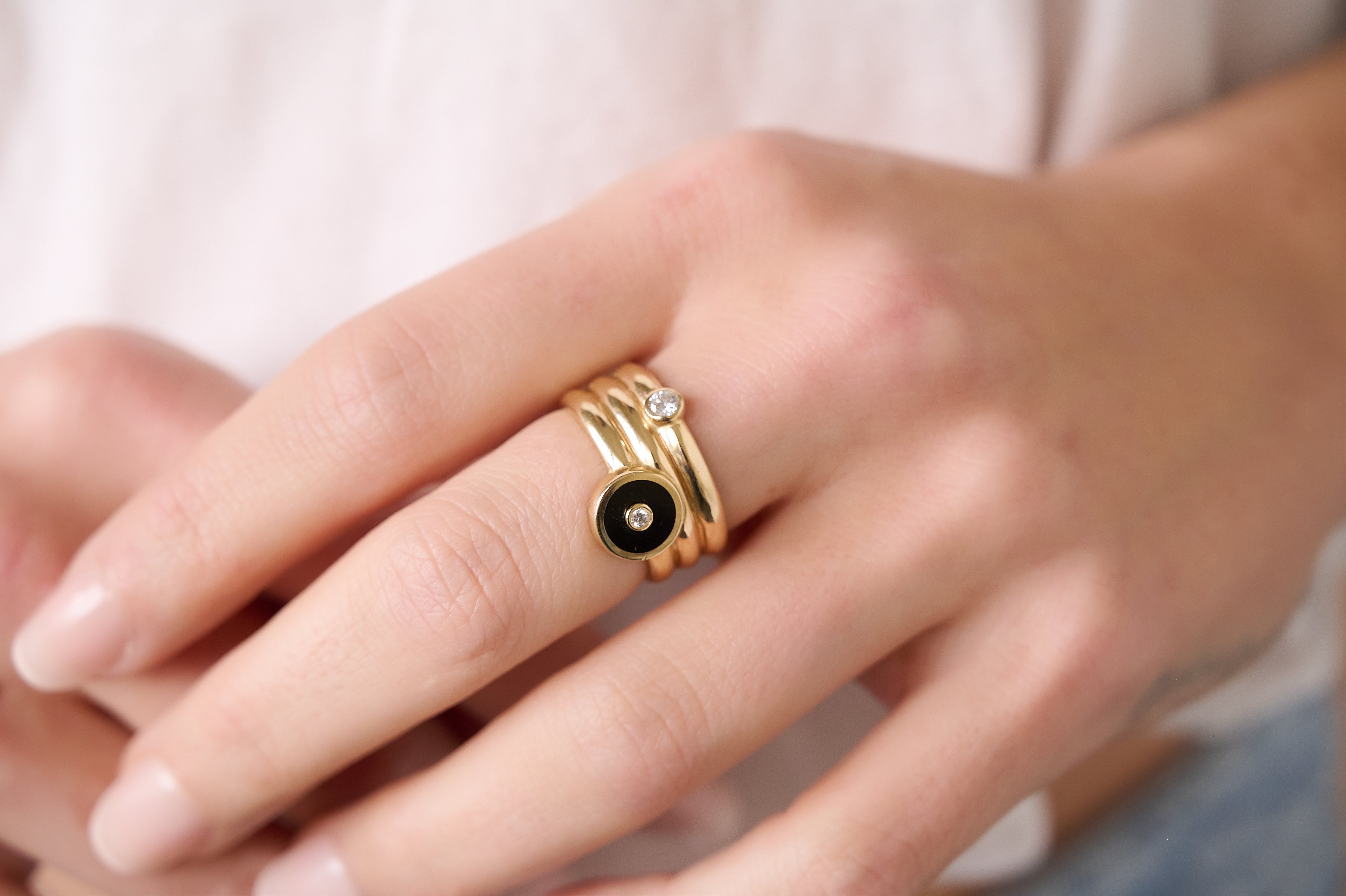 14k yellow gold triple coil mini compass ring by Retrouvai Tiny Gods on model