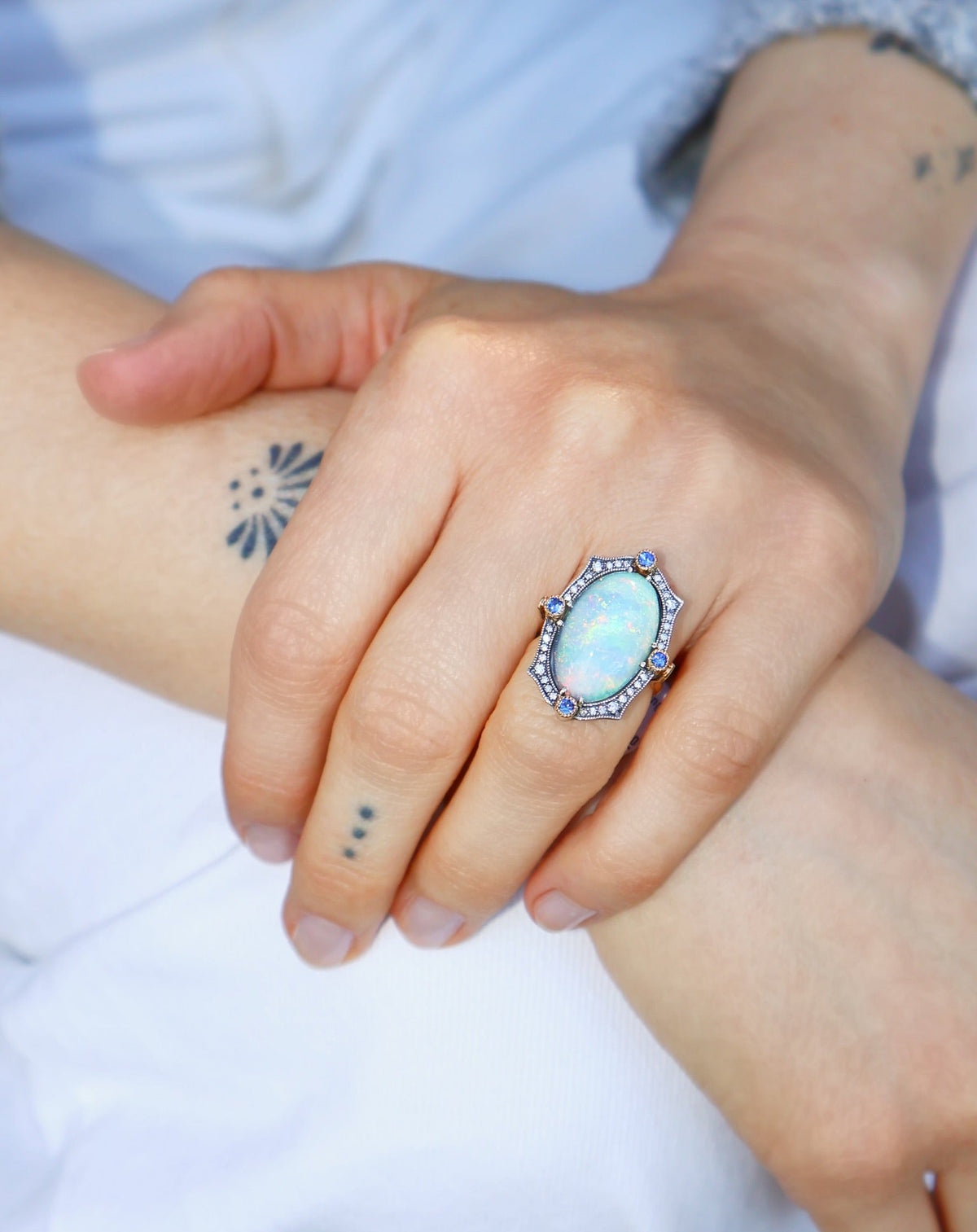 18k yellow gold and oxidized sterling silver diamond and blie sapphire bezel oval opal statement ring by Arman Sarkisyan Tiny Gods 