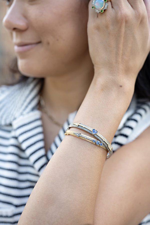 18k yellow gold and silver diamond and blue sapphire cupid's arrow bracelet by Arman Sarkisyan Tiny Gods