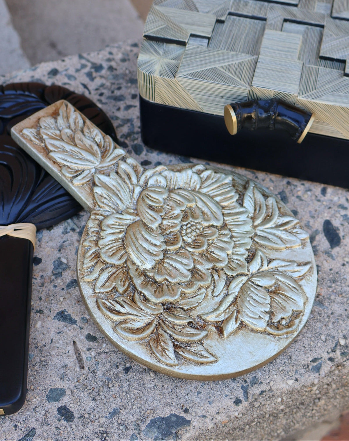 hand carved floral pattern wooden hand mirror by Silvia Furmanovich Tiny Gods 