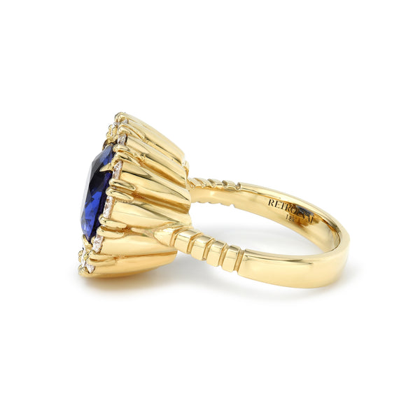 18k yellow gold one of a kind oval Tanzanite and Halo Diamond Heirloom Bezel Ring by Retrouvai at tiny gods