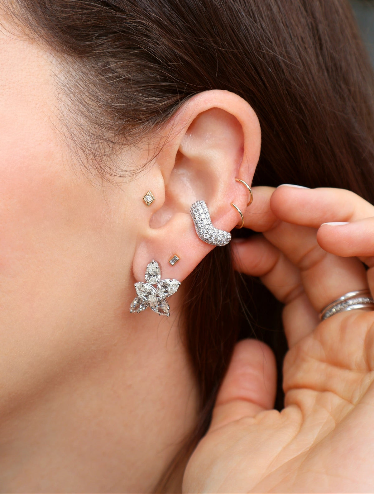 18k white gold pave diamond wave ear cuff by Tiny Gods