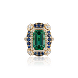 18k yellow gold emerald cut green tourmaline ring with diamond and blue sapphire border by Goshwara Tiny Gods