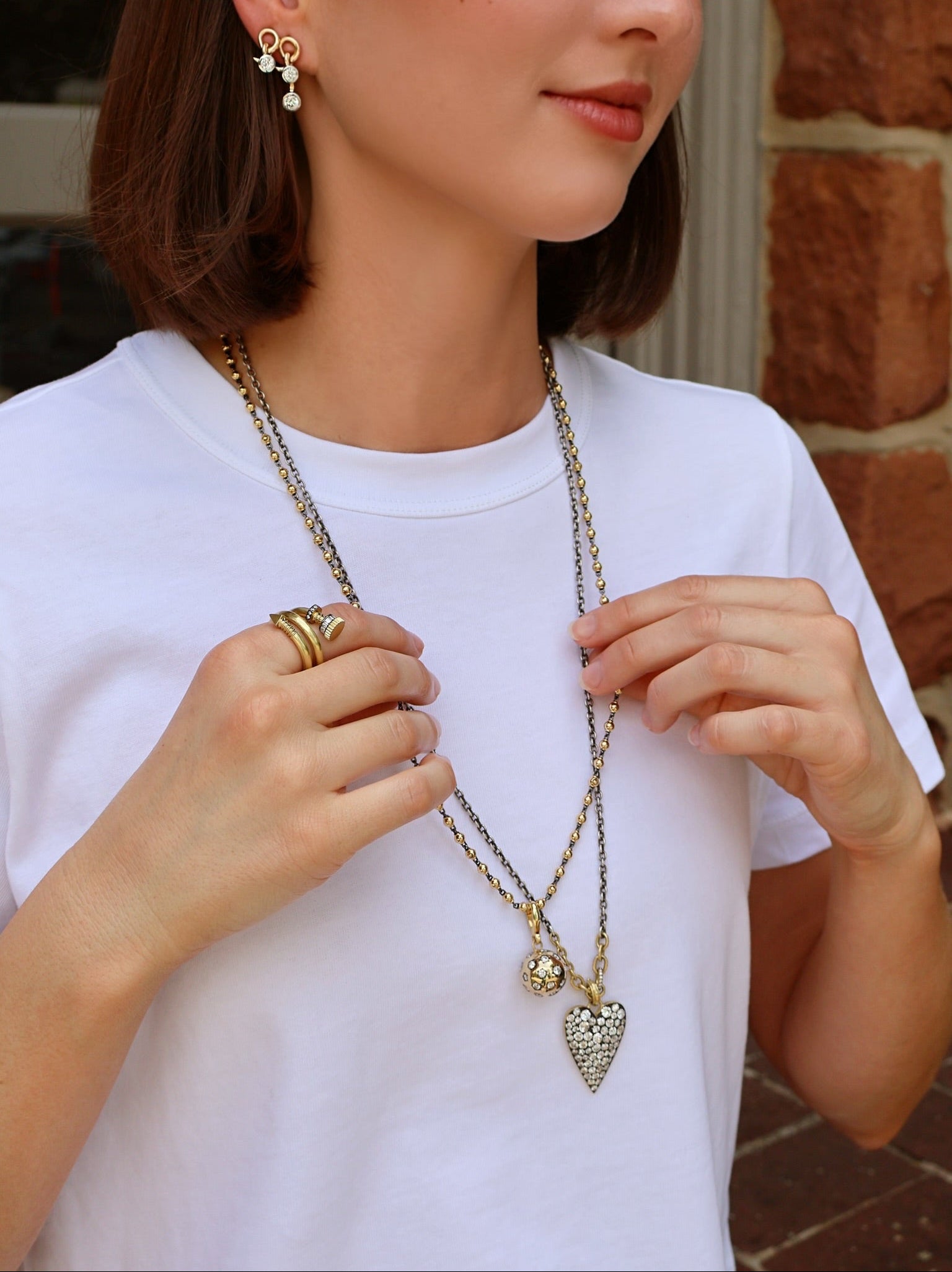 18k yellow gold diamond starburst orb ball pendant with black rhodium star setting by  Jenna Blake Tiny Gods 