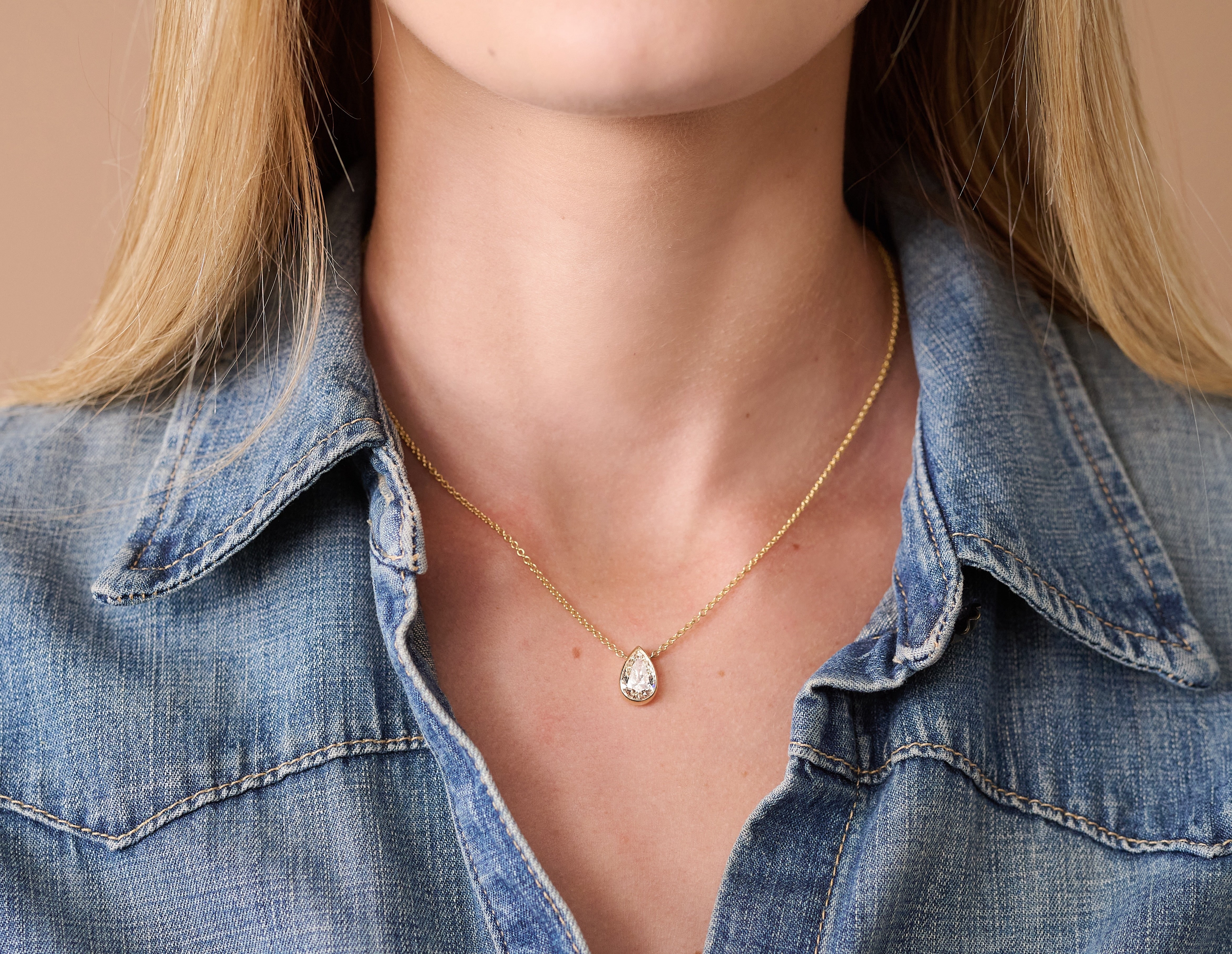 14k yellow gold 2ct pear cut diamond pendant necklace by Tiny Gods on model