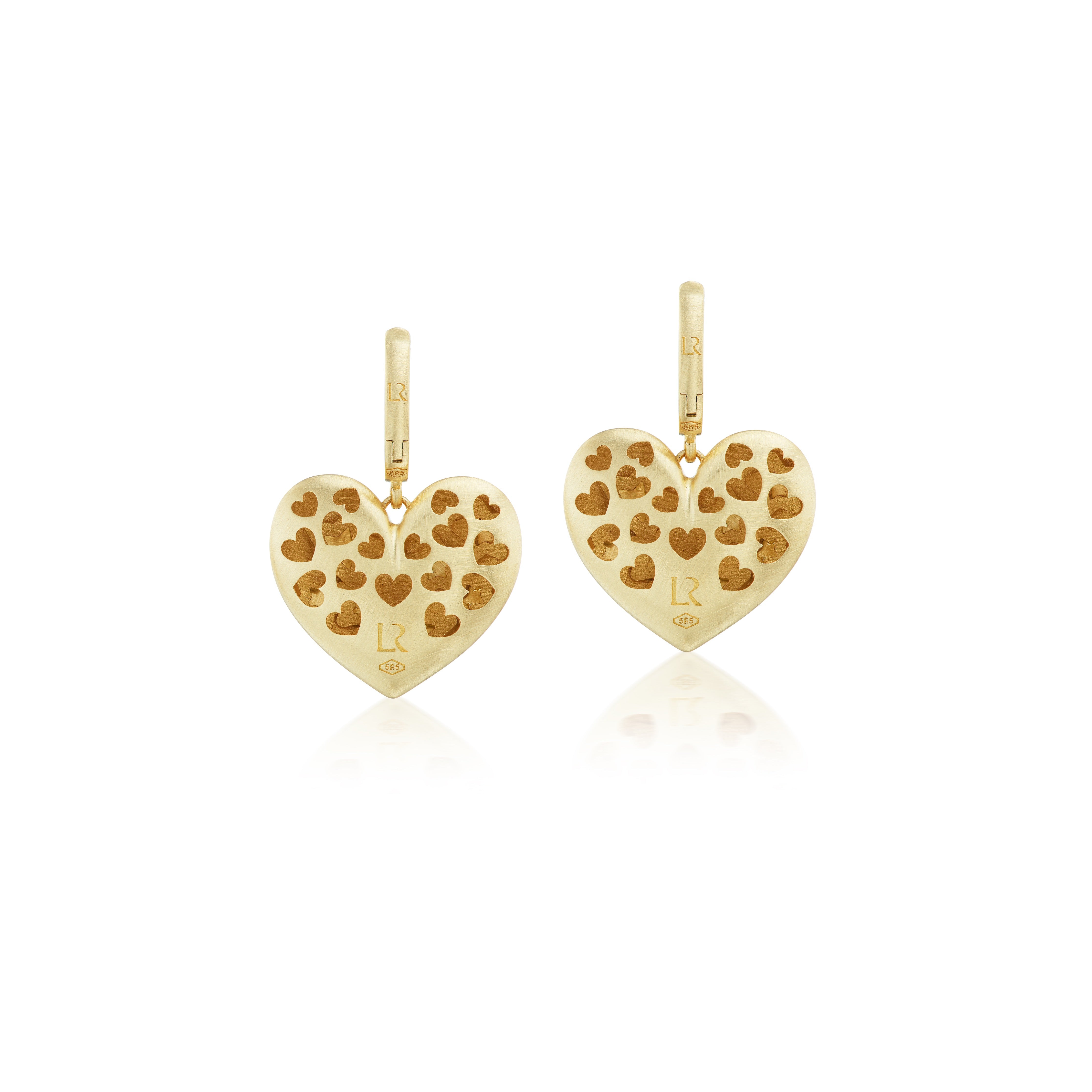14k yellow gold paulette puff heart earrings with stars by Lauren Rubinski Tiny Gods on model