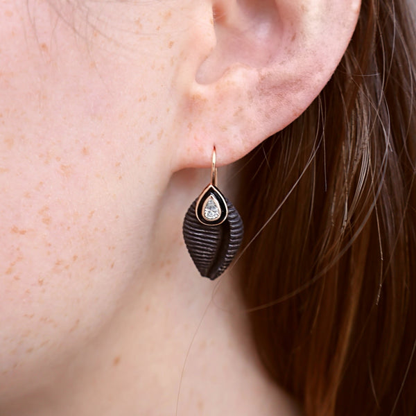 18k rose pear diamond with black enamel black cowry shell earring on wire by dezso Tiny Gods