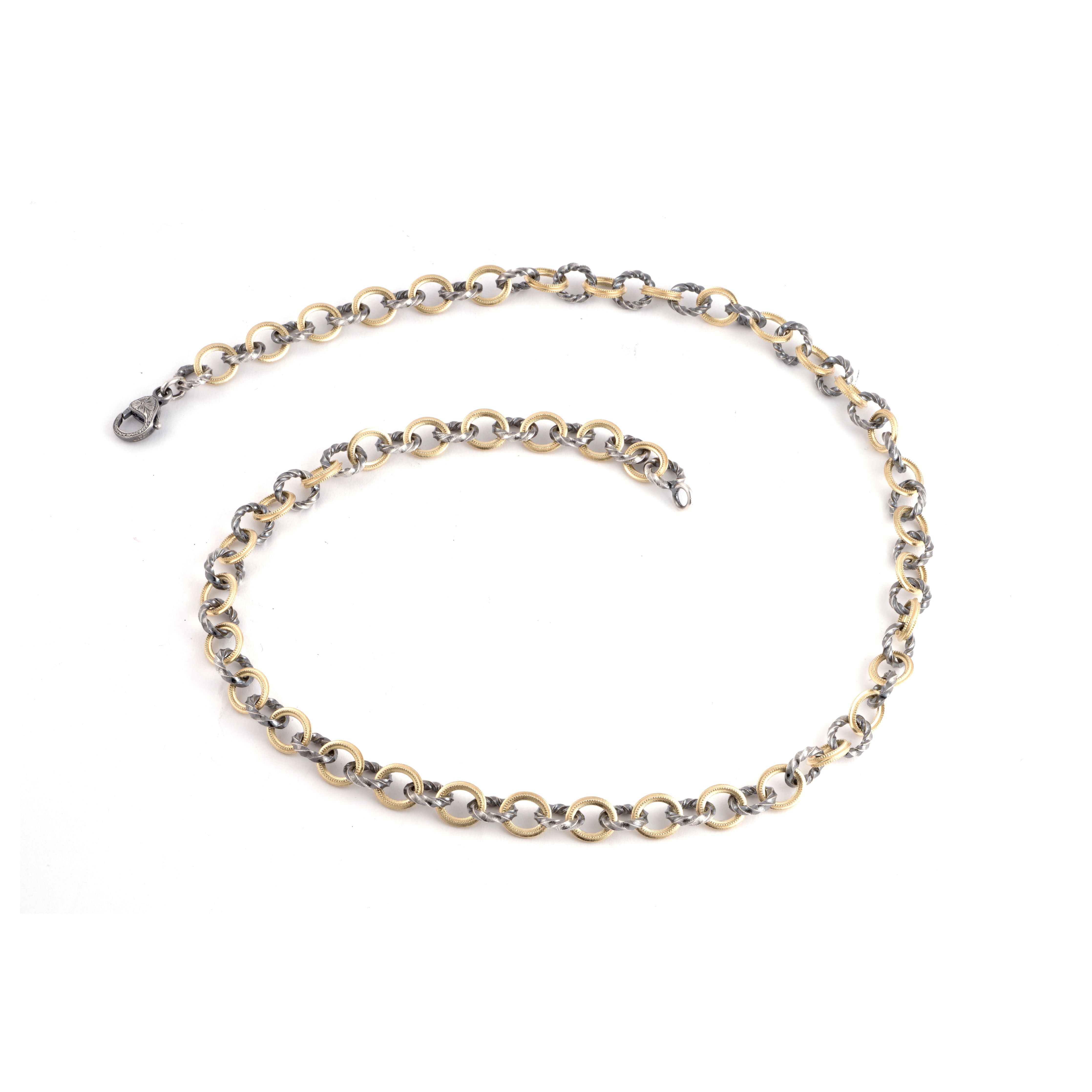 18k yellow gold and sterling silver small pirate chain necklace by Sylva & Cie Tiny Gods