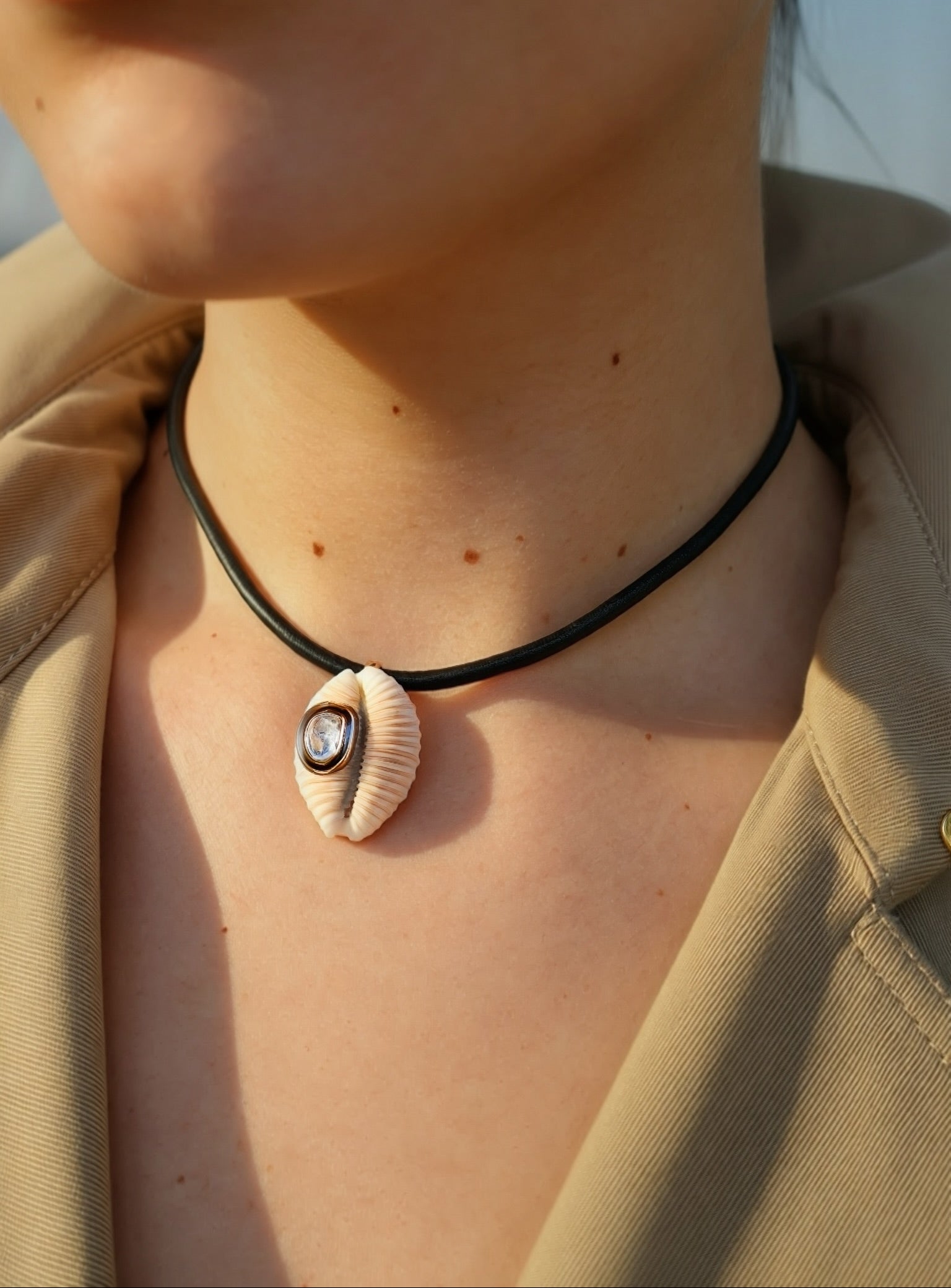 18k rose gold diamond cowry shell white pendant on leather cord by Dezso Tiny Gods 