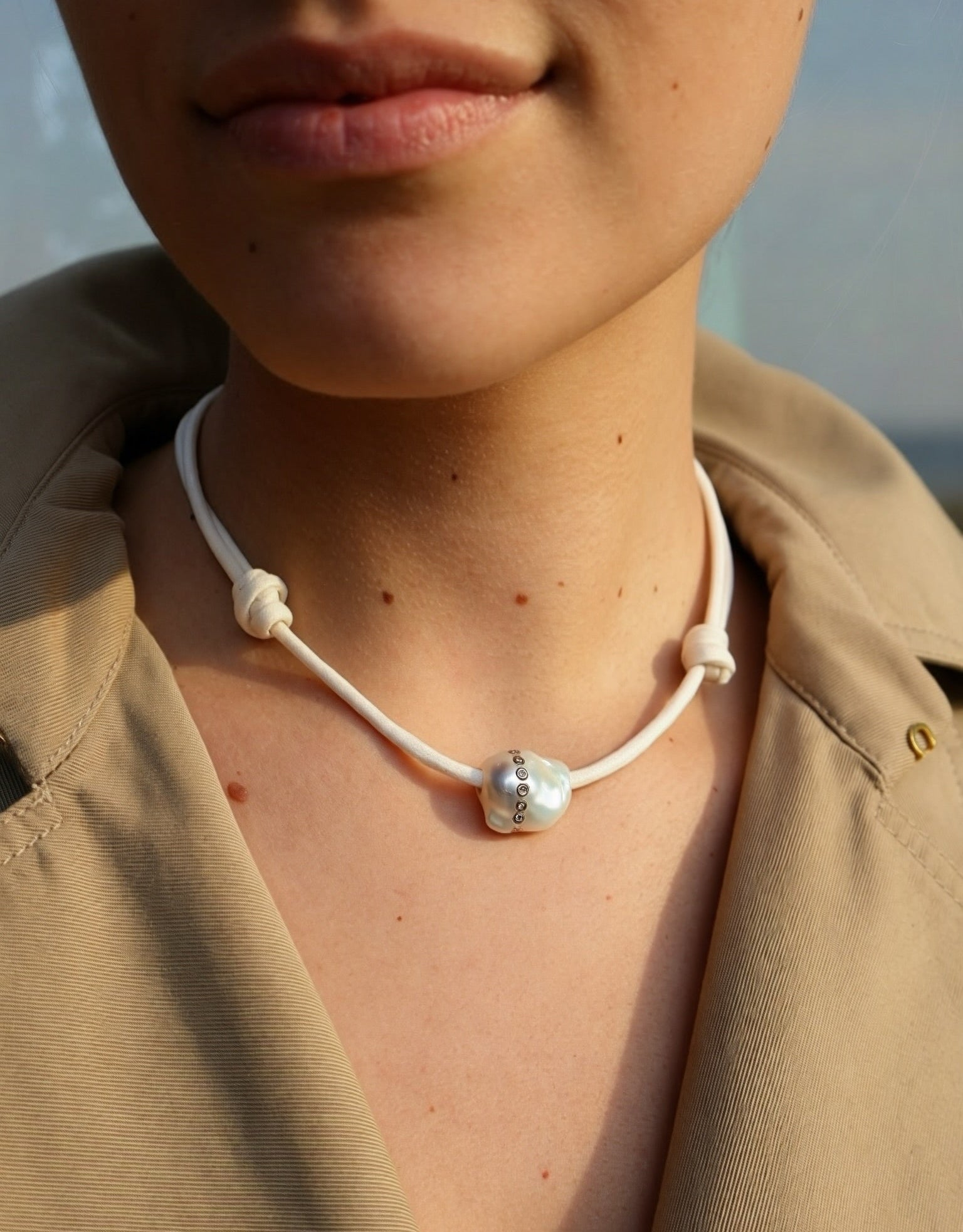 18k diamond rose gold pearl charm pendant necklace on paracord by Dezso Tiny Gods 