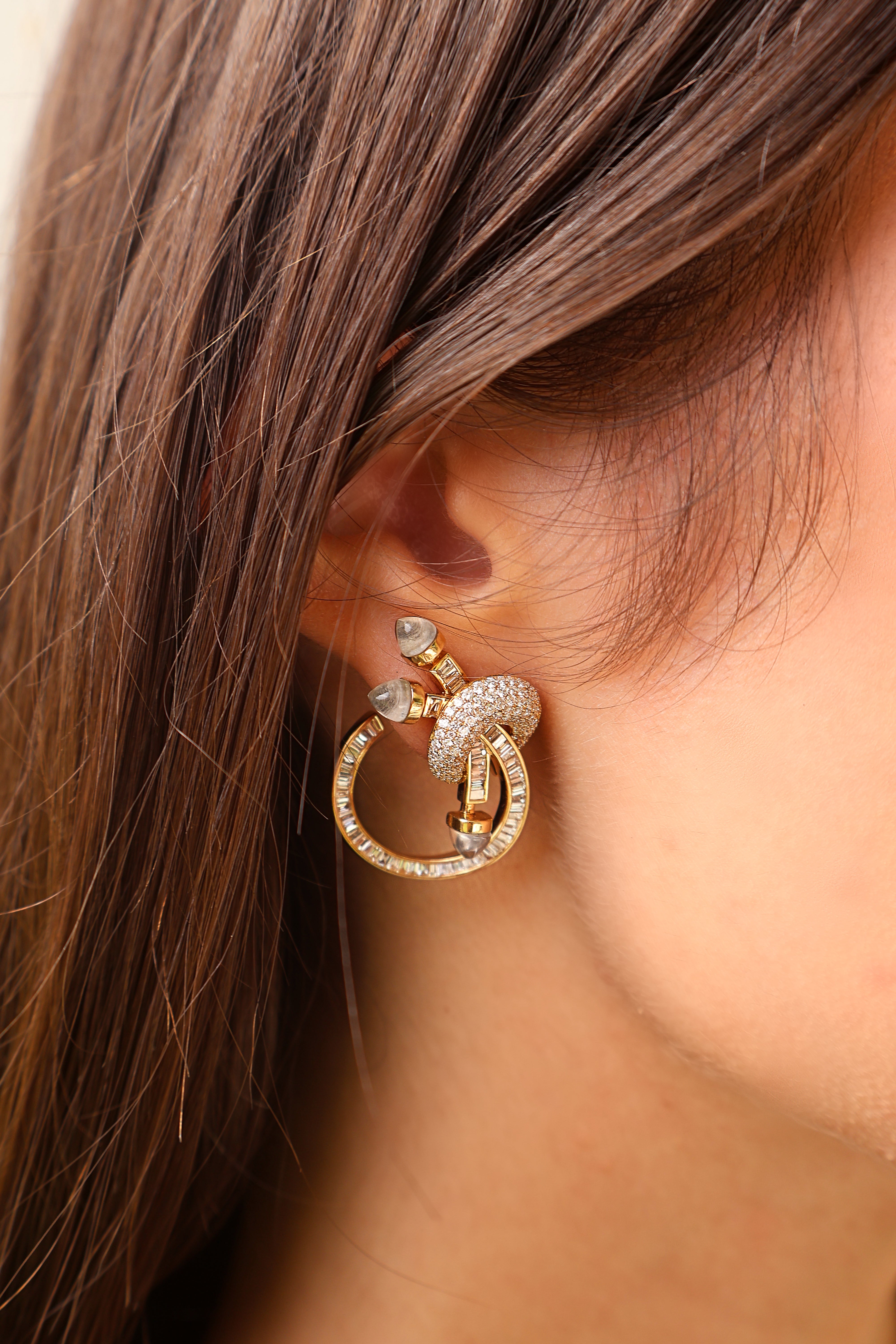 18k yellow gold round white and baguette diamond c-clip chakra earrings by Ananya Tiny Gods on model