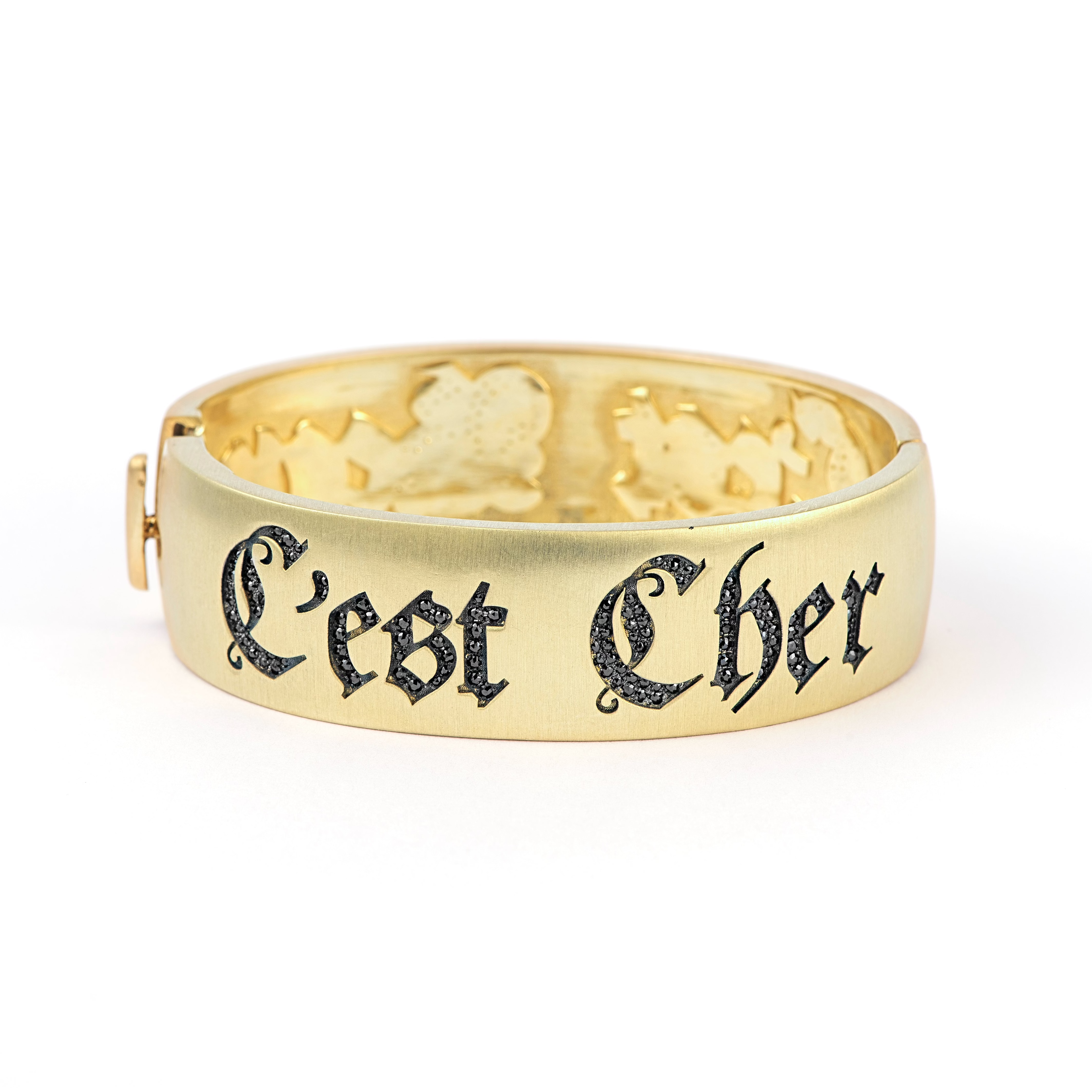 18k yellow gold black diamond inscription c'est beau c'est cher its beautiful its expensive cuff wide bracelet by Sylva & Cie Tiny Gods 