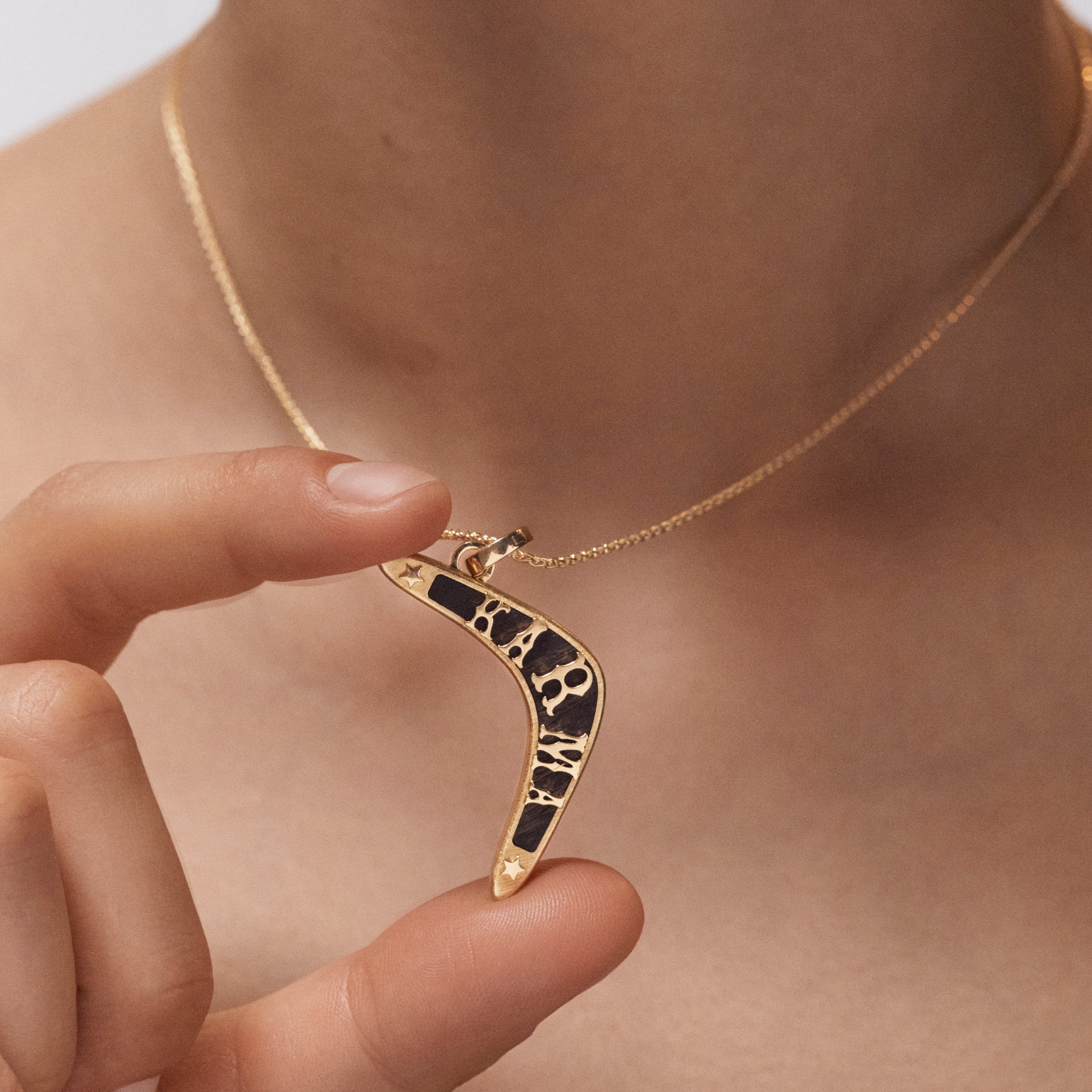 18k yellow gold black ebony wood karma boomerang pendant charm by Marie Lichtenberg Tiny Gods 