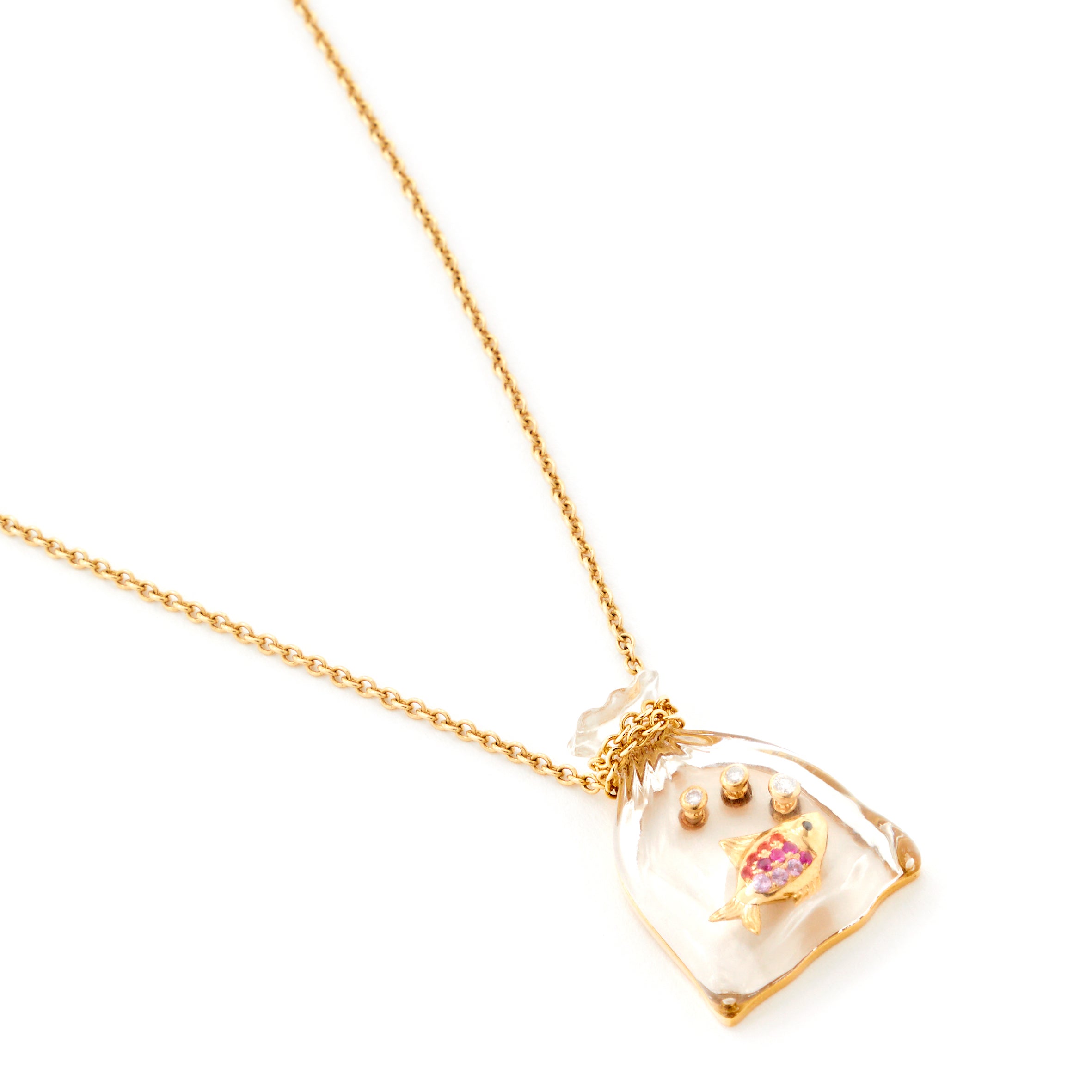 9k yellow gold pink sapphire fish in a crystal carved bag pendant by Yvonne Leon Tiny Gods 