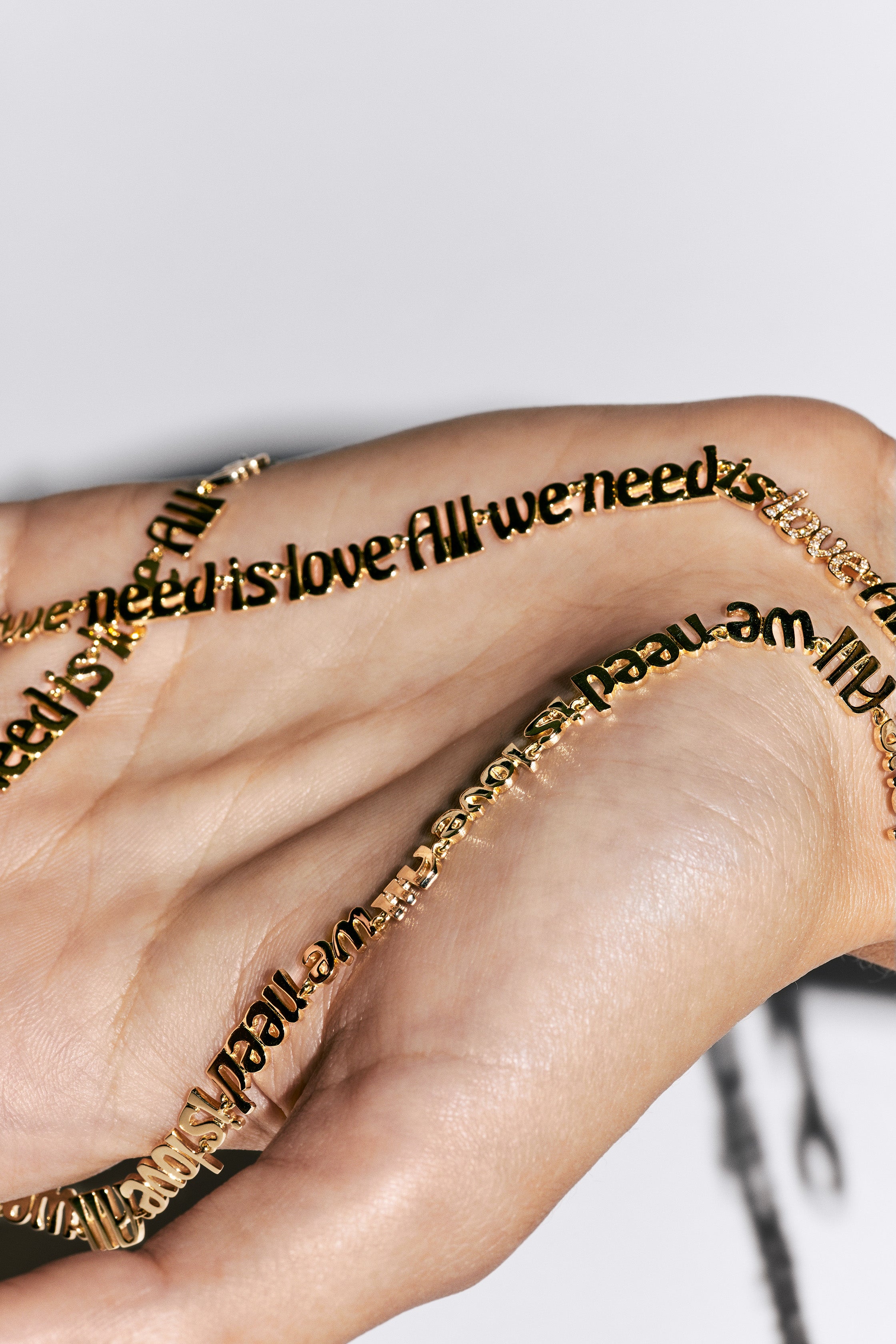 18k yellow gold diamond all we need is love chain link necklace by Marie Lichtenberg Tiny Gods