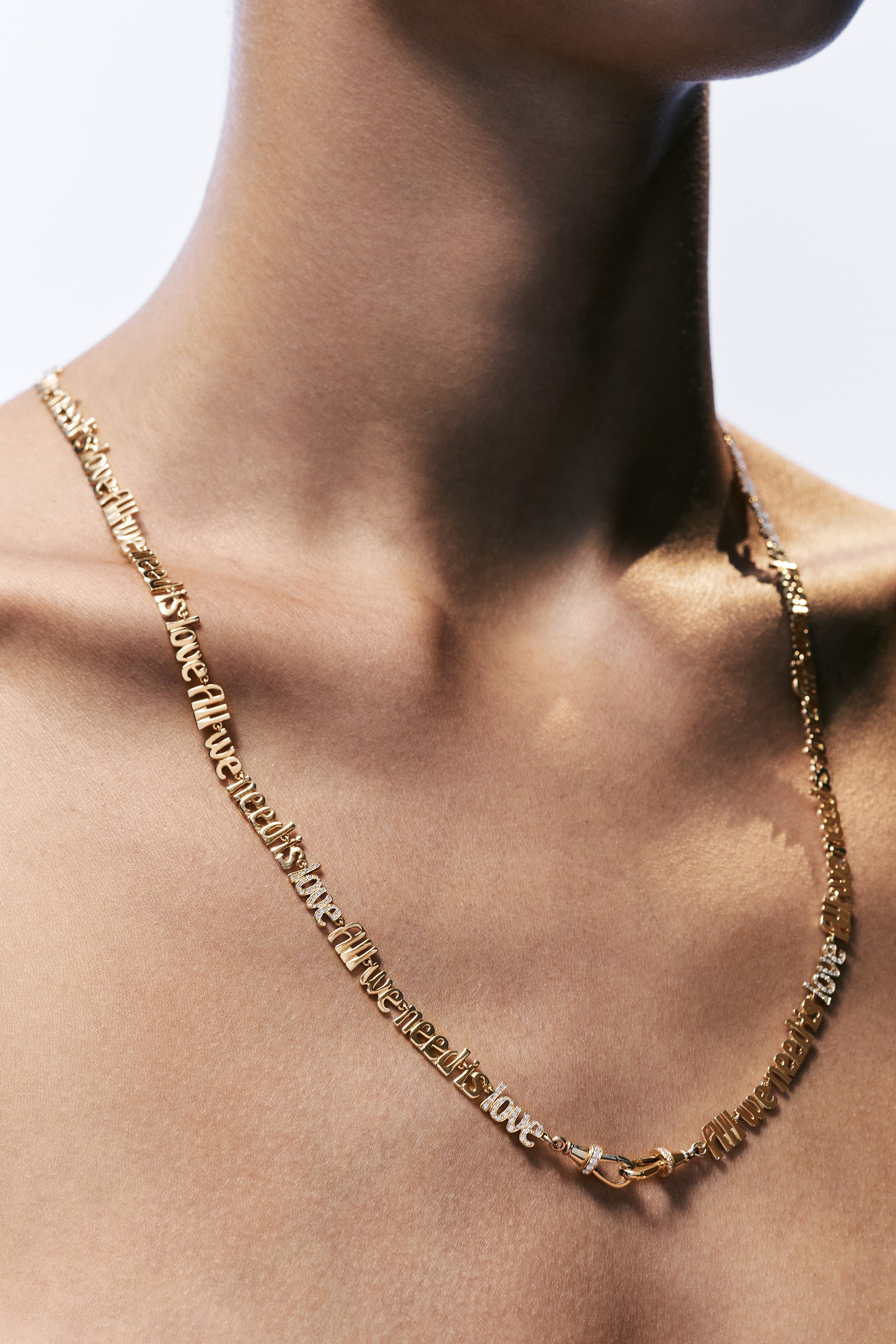 18k yellow gold diamond all we need is love chain link necklace by Marie Lichtenberg Tiny Gods