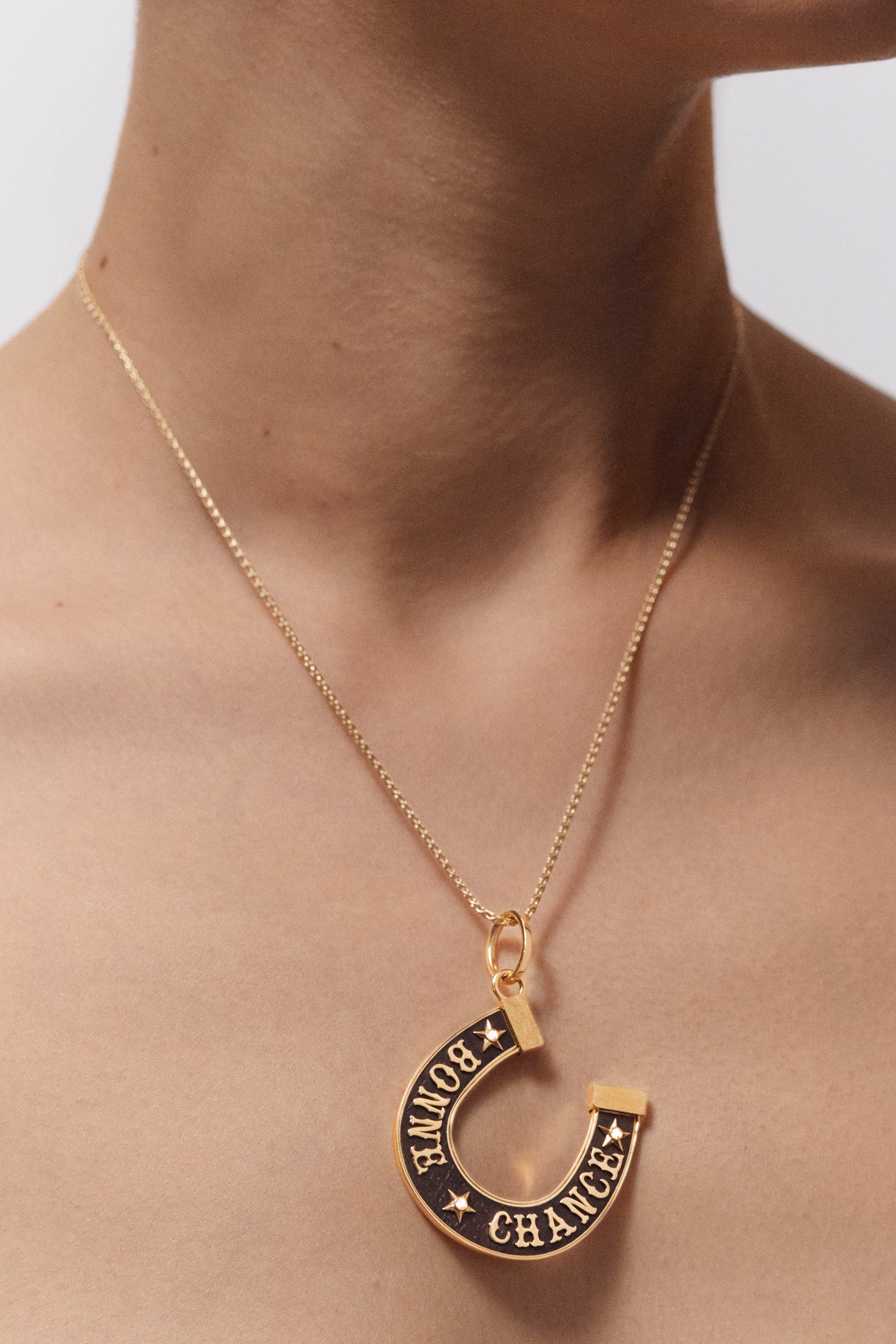 18k yellow gold black ebony wood Bonne Chance horseshoe lucky pendant good luck charm by Marie Lichtenberg Tiny Gods 