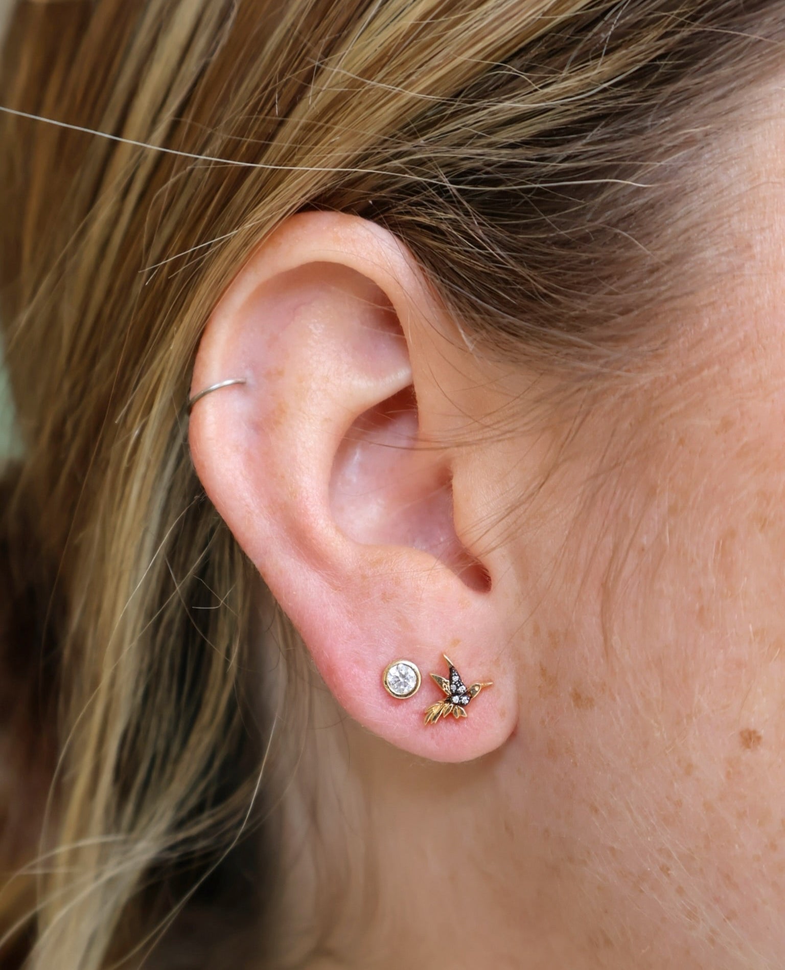 18k yellow gold diamond and black rhodium plated hummingbird stud earrings by Sorellina Tiny Gods 