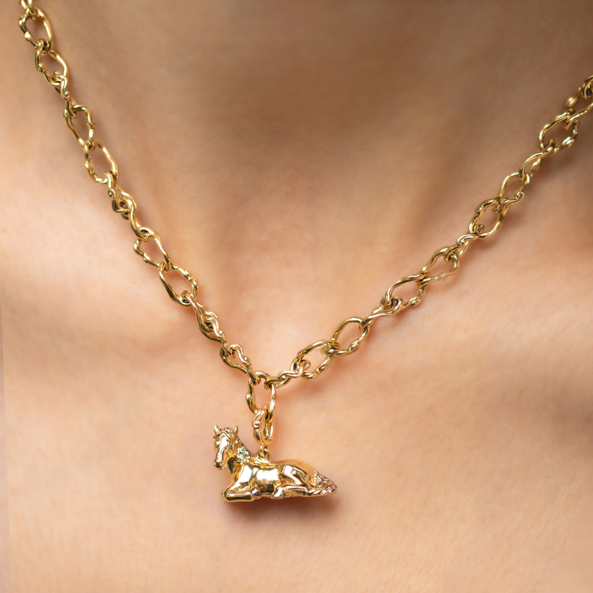 18k yellow gold diamond laying horse pendant bestiary by Bibi van der Velden Tiny Gods