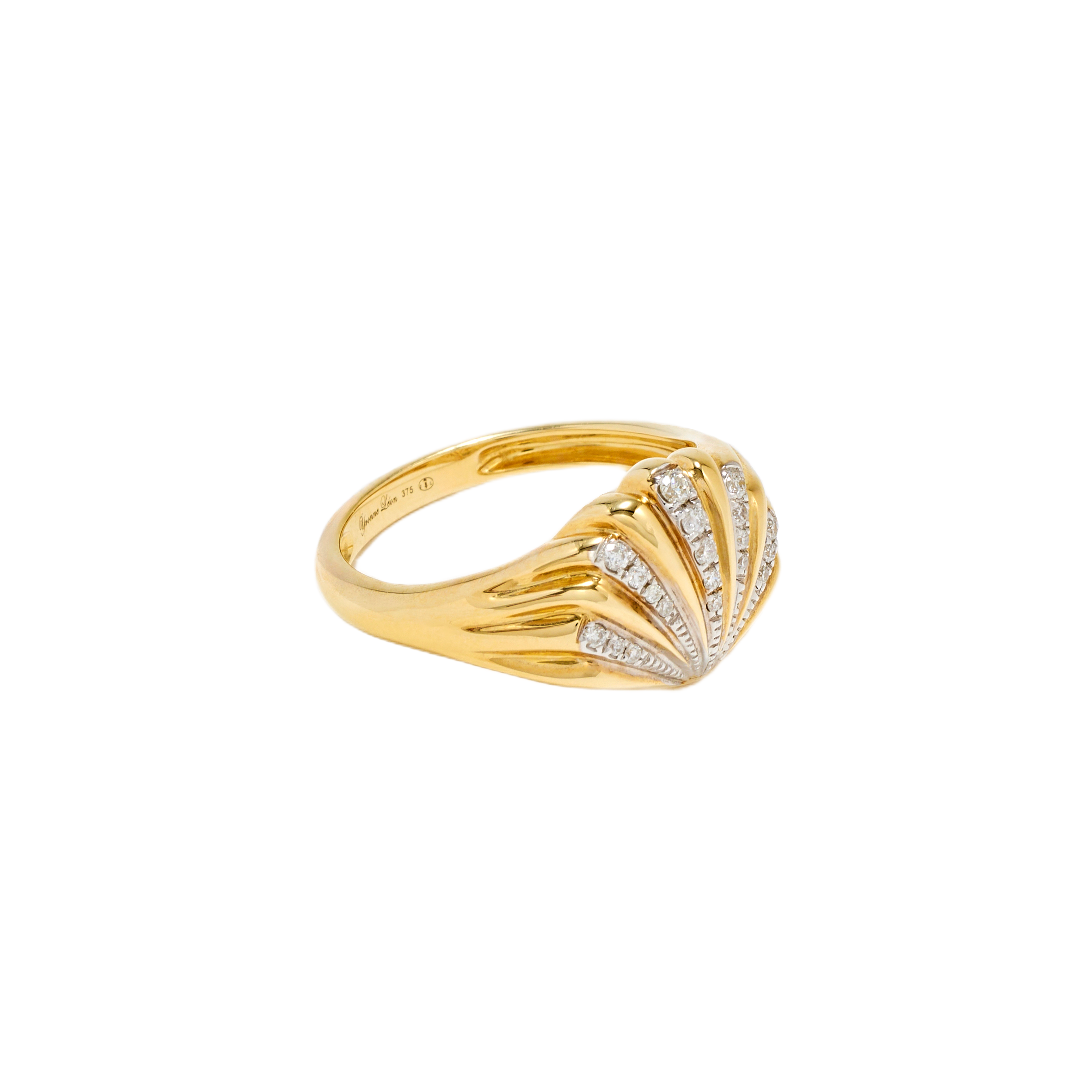 Yellow gold and diamond baby shell ring by Yvonne Leon and Tiny Gods