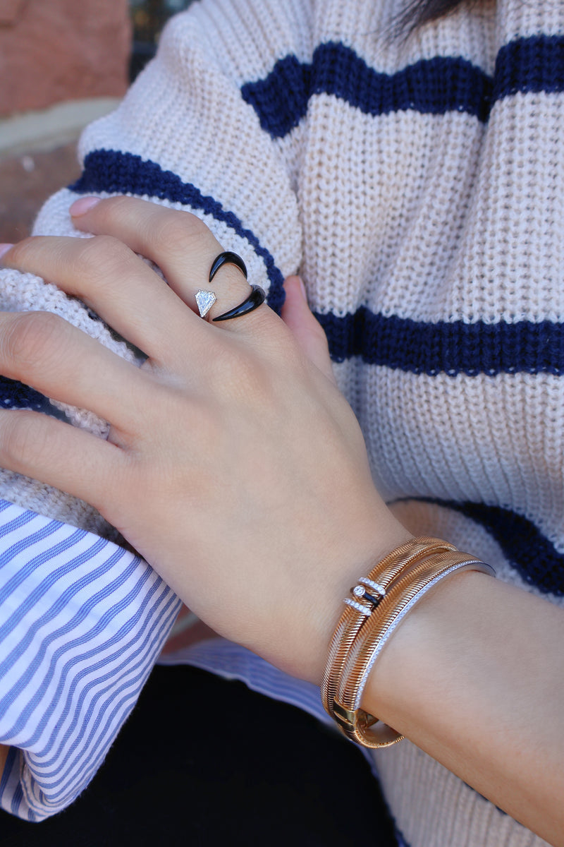 18k yellow gold feelings bracelet with diamonds and black enamel ring by Nikos Koulis Tiny Gods