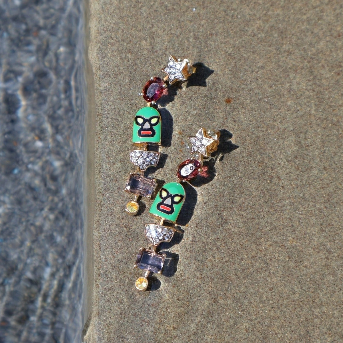 Yellow gold Luchadores hurricaine long wrestler dangle star earrings in pink, purple, green by Francesca Villa, Tiny Gods