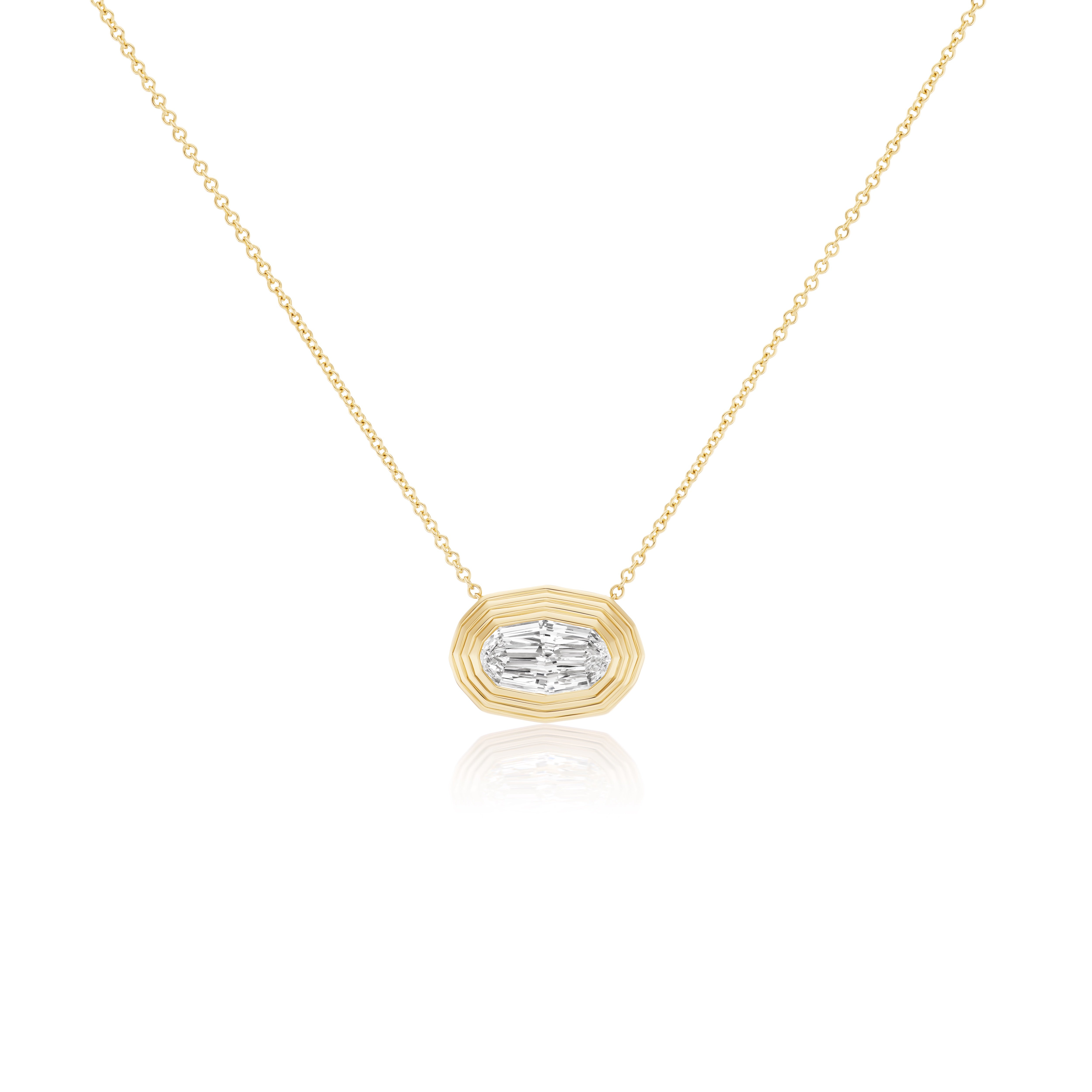 18k yellow gold modified GIA certified oval cut diamond bezel set in a ridged bezel setting on a fine link chain Tiny Gods 