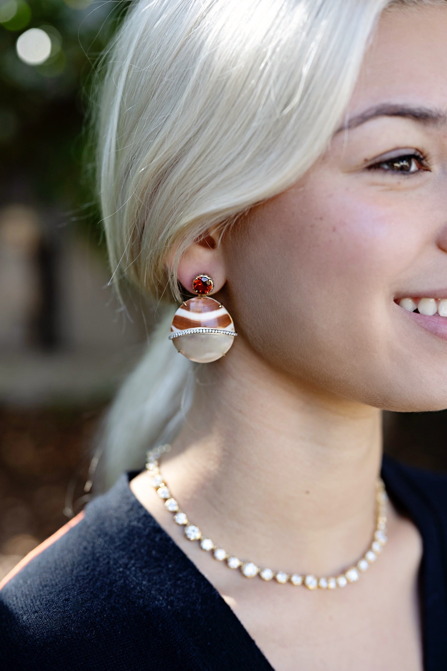 yellow gold and nautilus shell earrings with diamonds and riograndense citrine by Silvia furmanovich Tiny Gods 