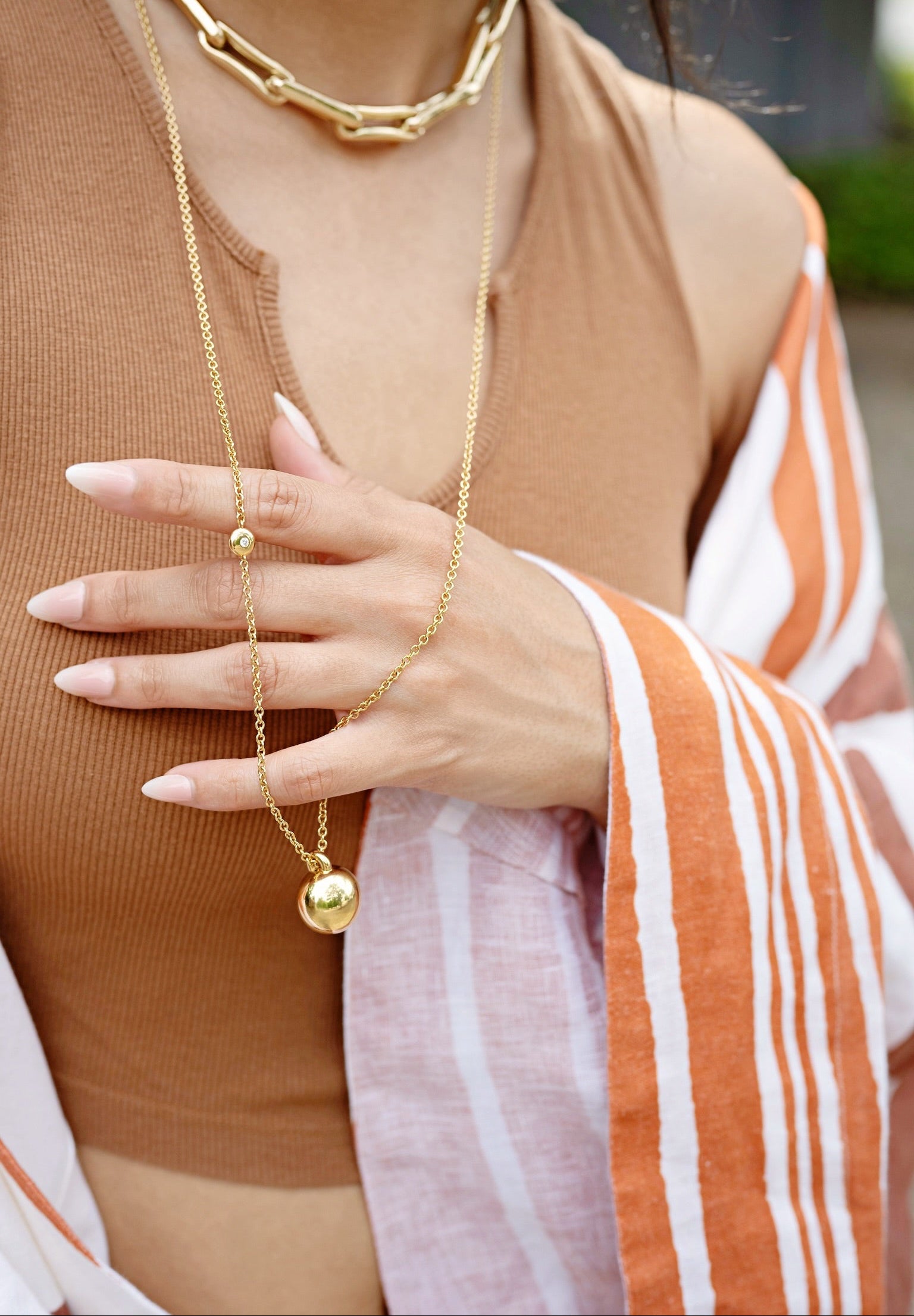 18k yellow gold orb on a long diamond stationary chain necklace Tiny Gods 
