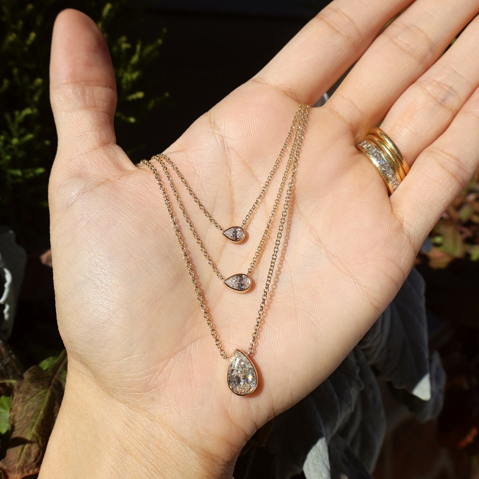 14k yellow gold pear cut diamond bezel set pendant. necklace by Tiny Gods 