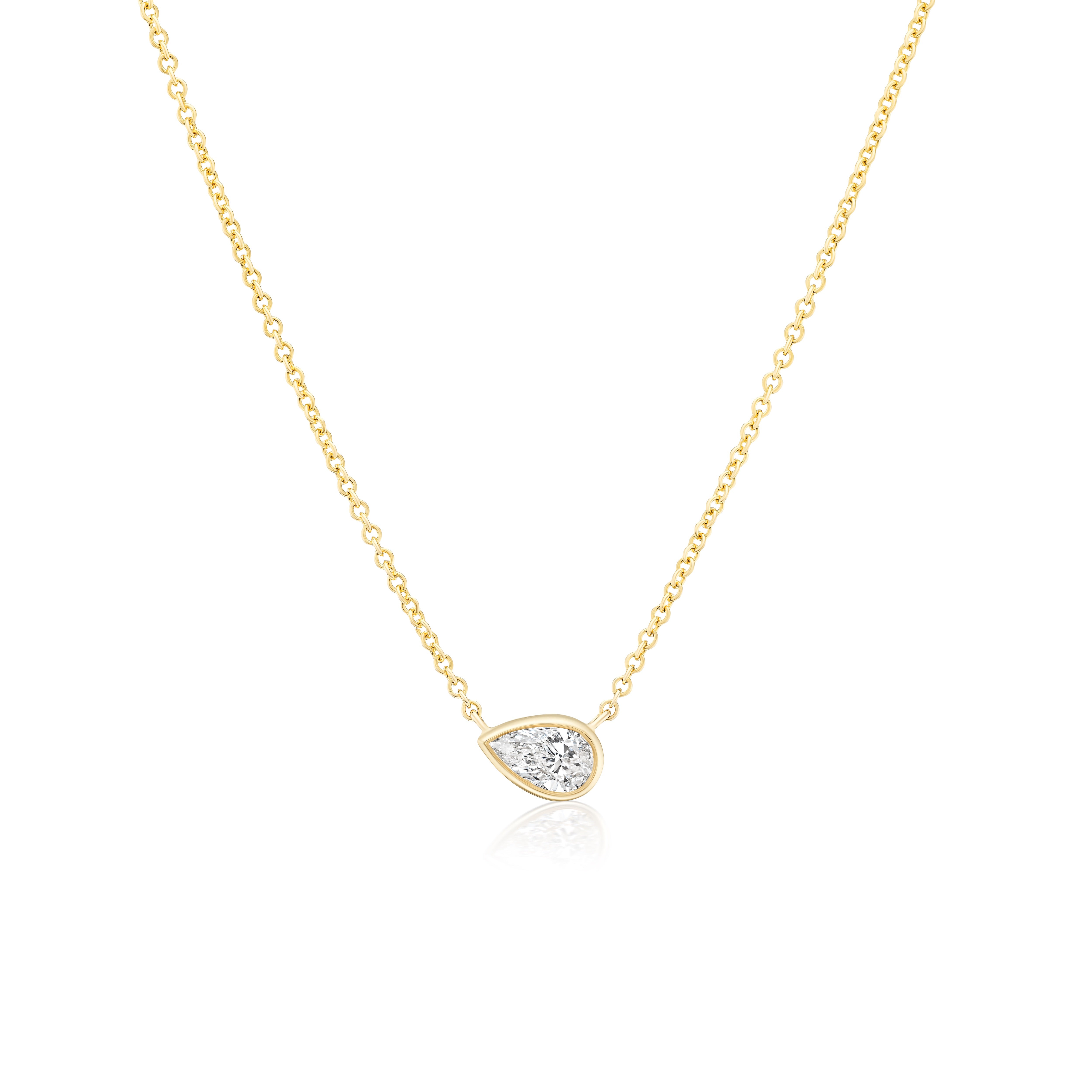 14k yellow gold pear cut diamond bezel set pendant. necklace by Tiny Gods 