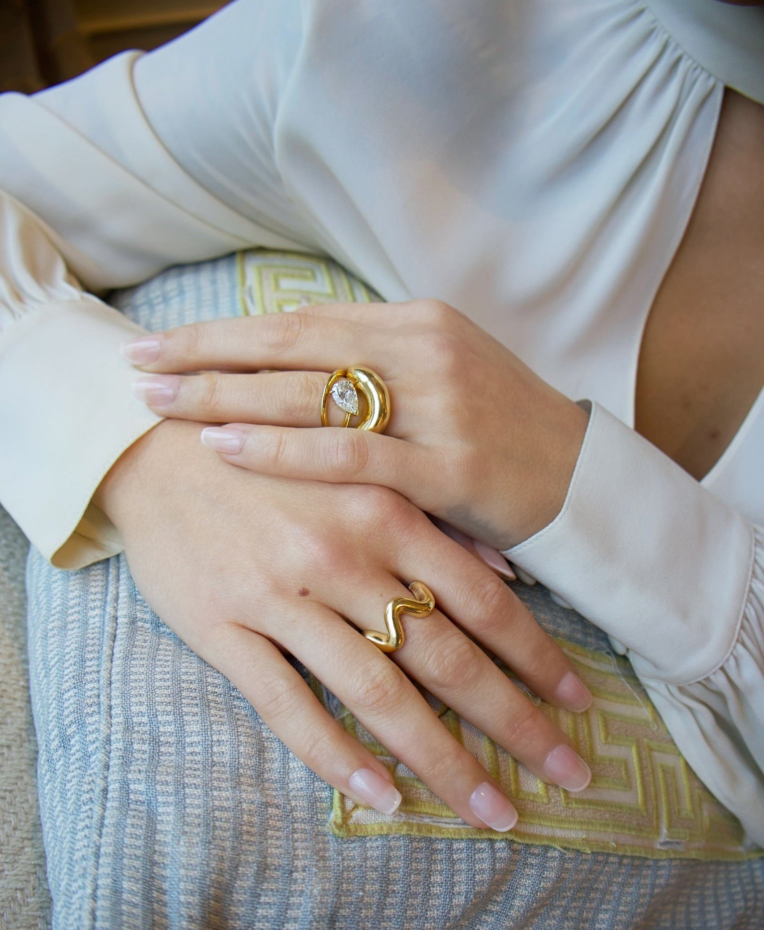 18k yellow gold pear cut diamond wrap floating ring by Tiny Gods 