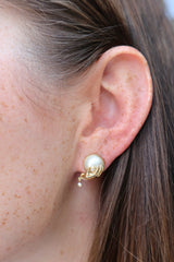 18k yellow gold pearl boob in hands Venus earring stud by Sauer Tiny Gods