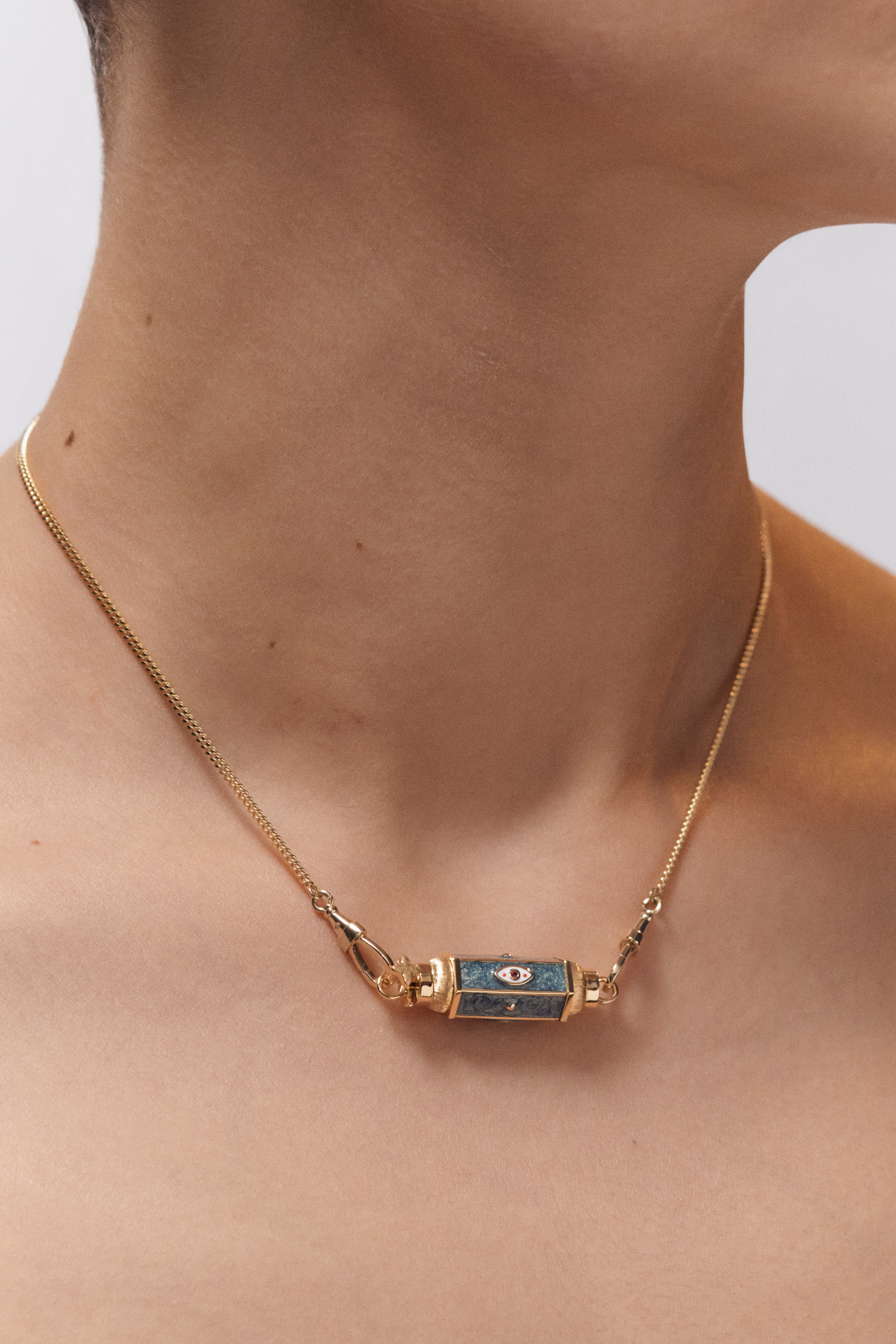 18k yellow gold evil eye green enamel baby locket pendant necklace by Marie Lichtenberg Tiny Gods 