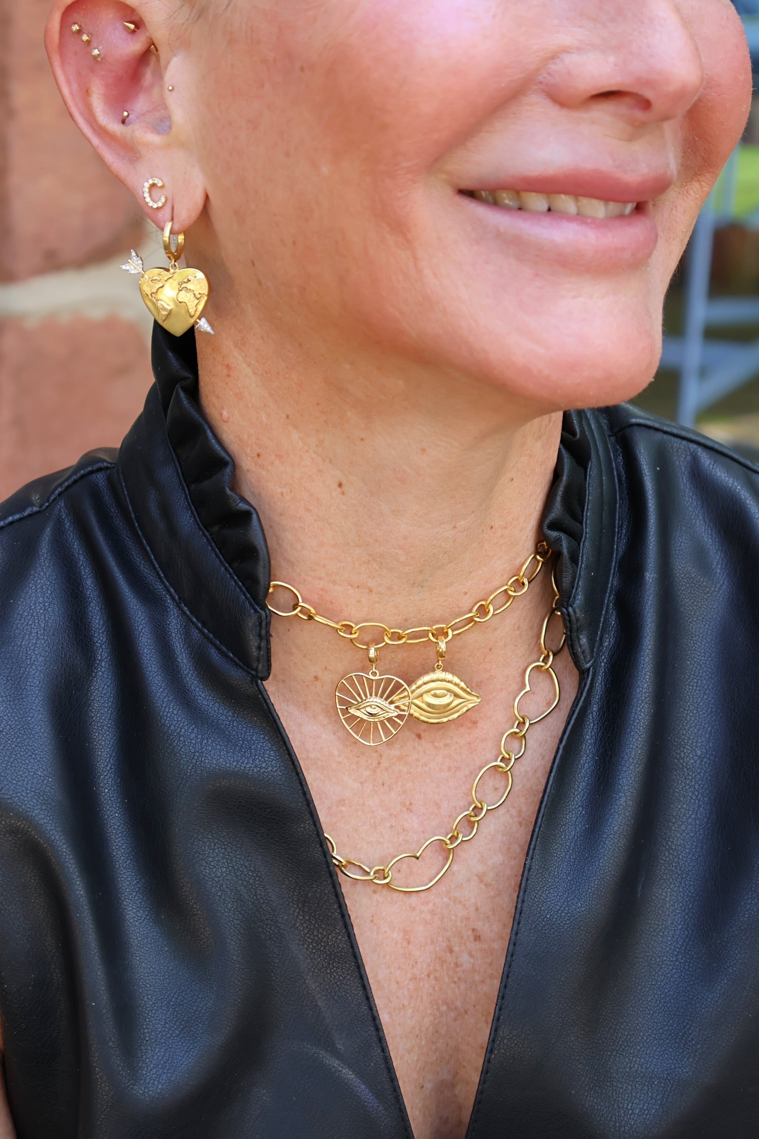 18k yellow gold small radial evil eye heart pendant by Christina Alexiou Tiny Gods 