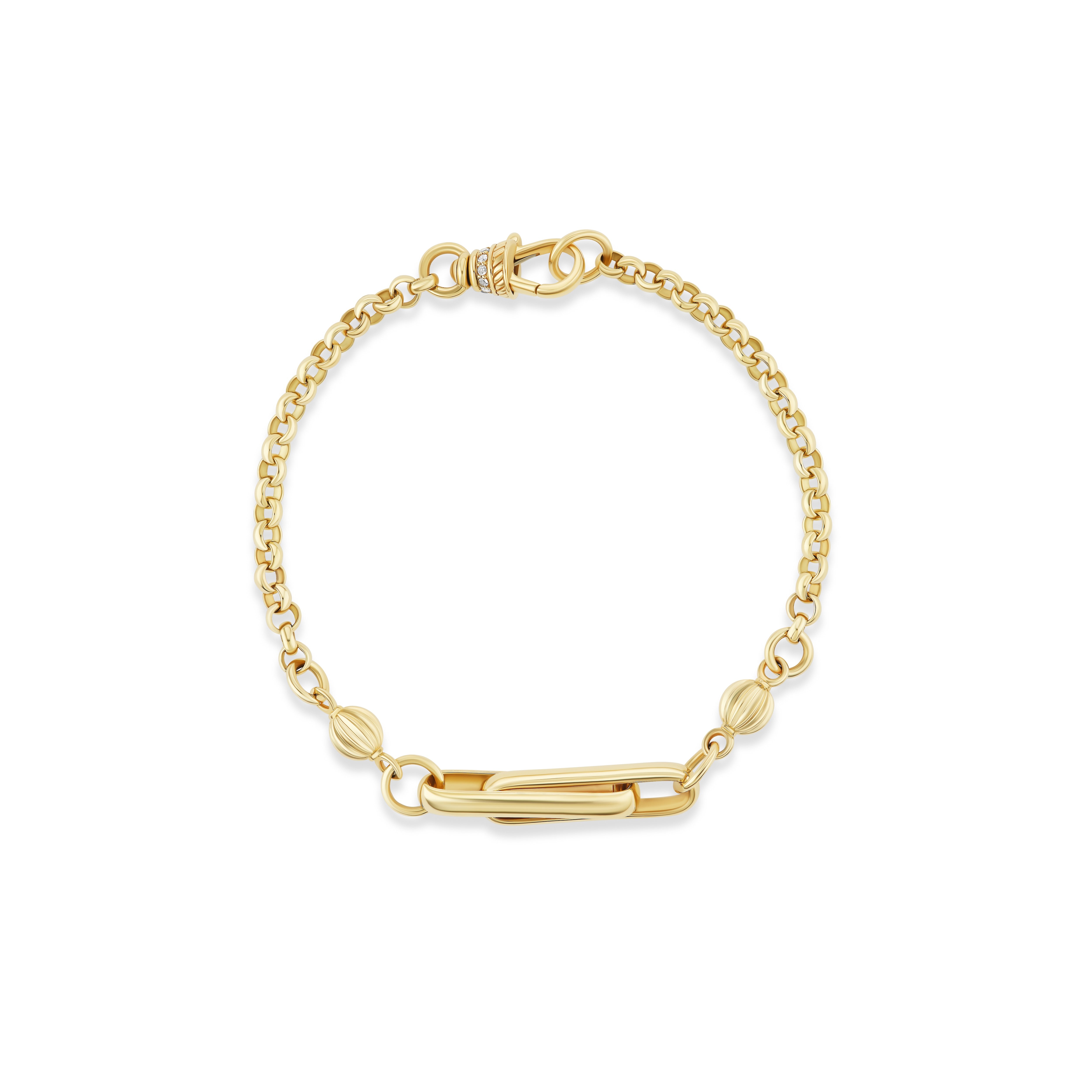 Stirrup yellow gold rolo bracelet by Lucy Delius Tiny Gods 