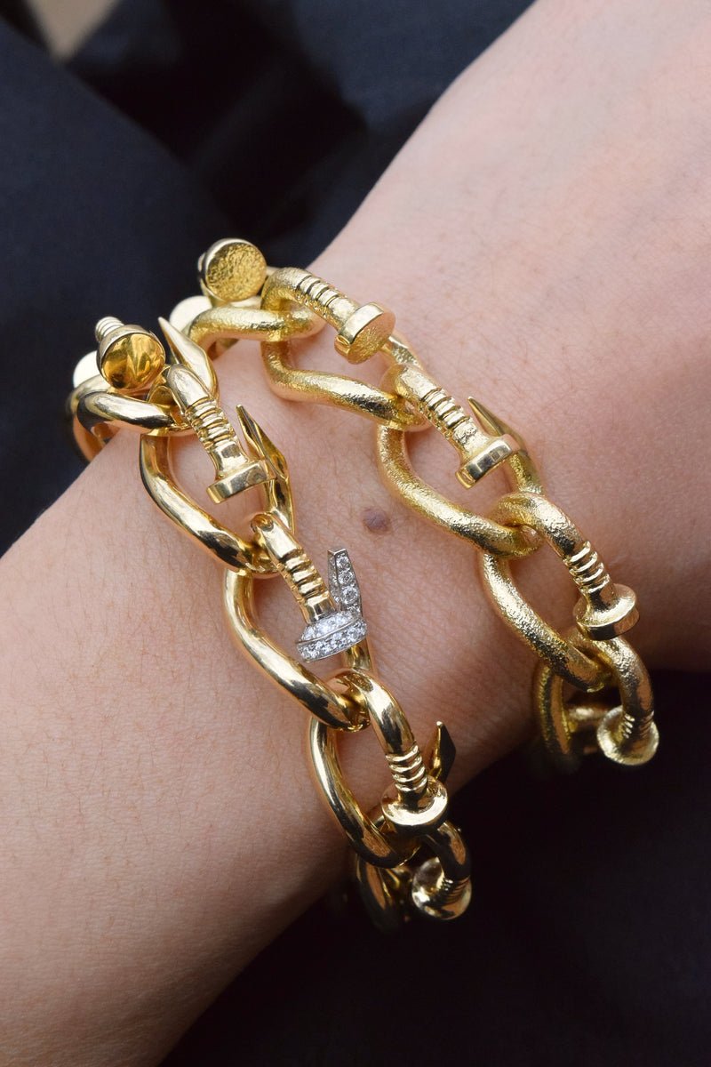 18kt yellow gold David Webb Hammered Nail Link Bracelet Tiny Gods on model