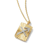 18k yellow gold sagittarius zodiac pendant buckle with diamonds by David Webb Tiny Gods