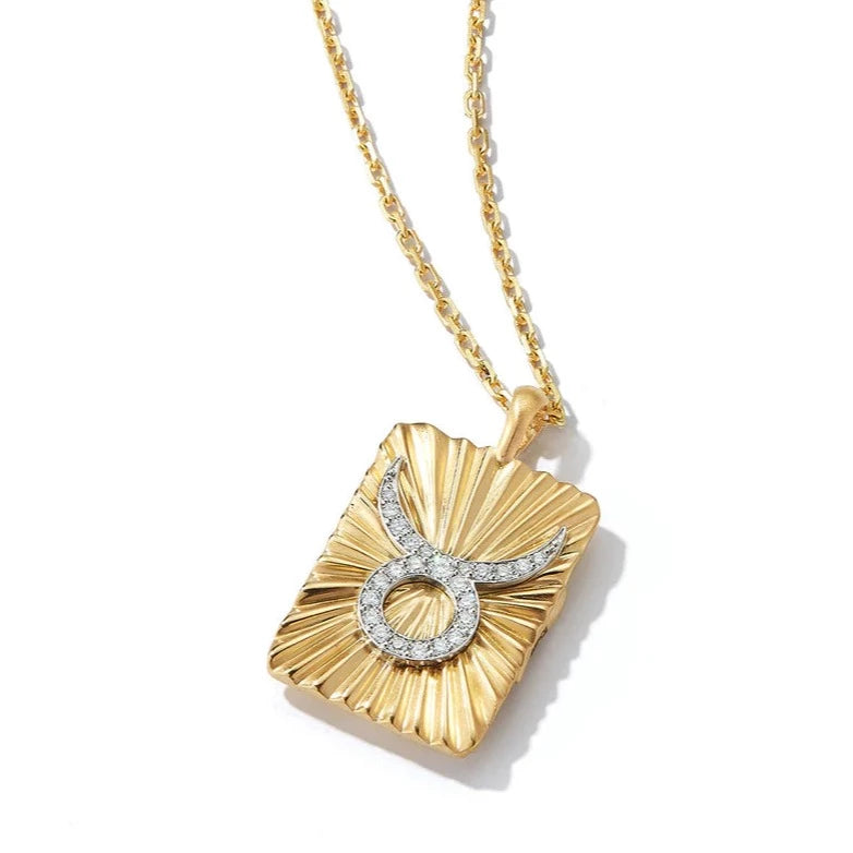 18k yellow gold diamond taurus zodiac pendant buckle by David Webb Tiny Gods