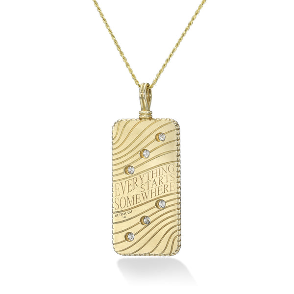 14k yellow gold domino pendant back with inscription everything starts somewhere by Retrouvai Tiny Gods