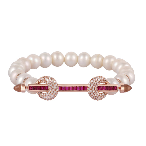 Ananya chakra bracelet with 19 white pearls and 4 diamond rondelle beads. 18k yellow gold bar with square cut rubies, diamond encrusted loops and cabochon crystals. 