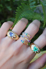 18K yellow gold Sorellina rings at tiny gods on model emerald heart starburst ring