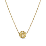 18k yellow gold mini yin yang pendant with diamonds by Retrouvai