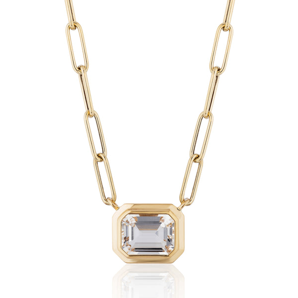18k yellow gold emerald cut rock crystal pendant on a paperclip chain by Goshwara Tiny Gods